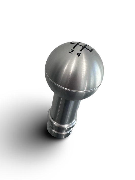 Stunning 2 piece  5-speed aluminum gear shifter knob accented with sleek black numerical markings.