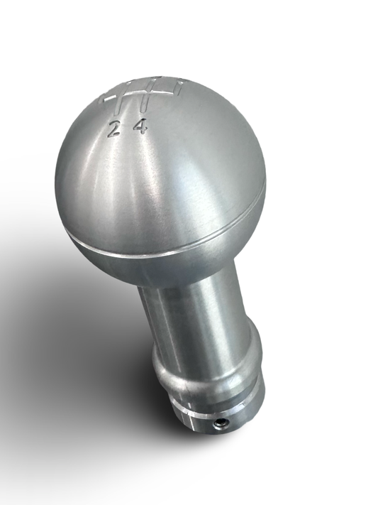 Exquisite two-piece aluminum 5-speed gear shifter knob.